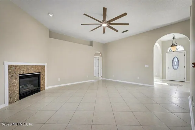 a kitchen with granite countertop a sink and cabinets