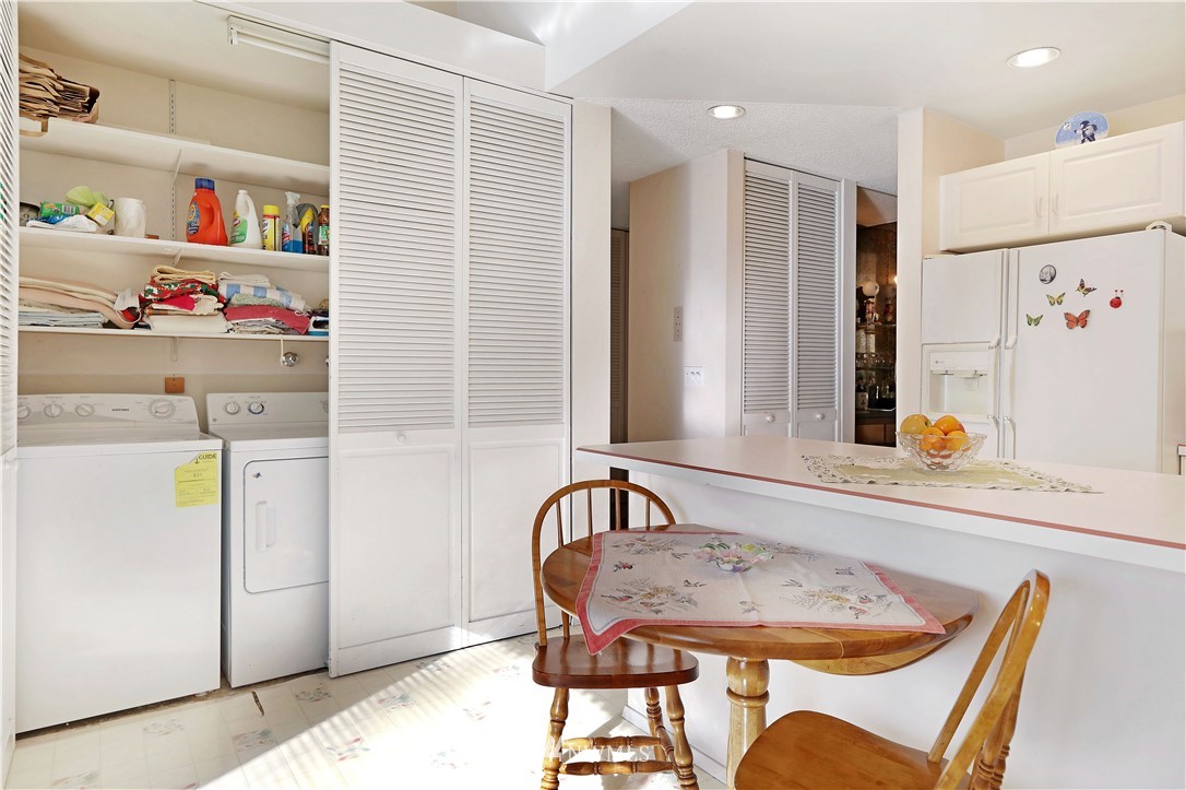 6413 Sand Point Way Northeast Seattle, WA 98115 - Photo 22 of 25 a view of a dining room with furniture