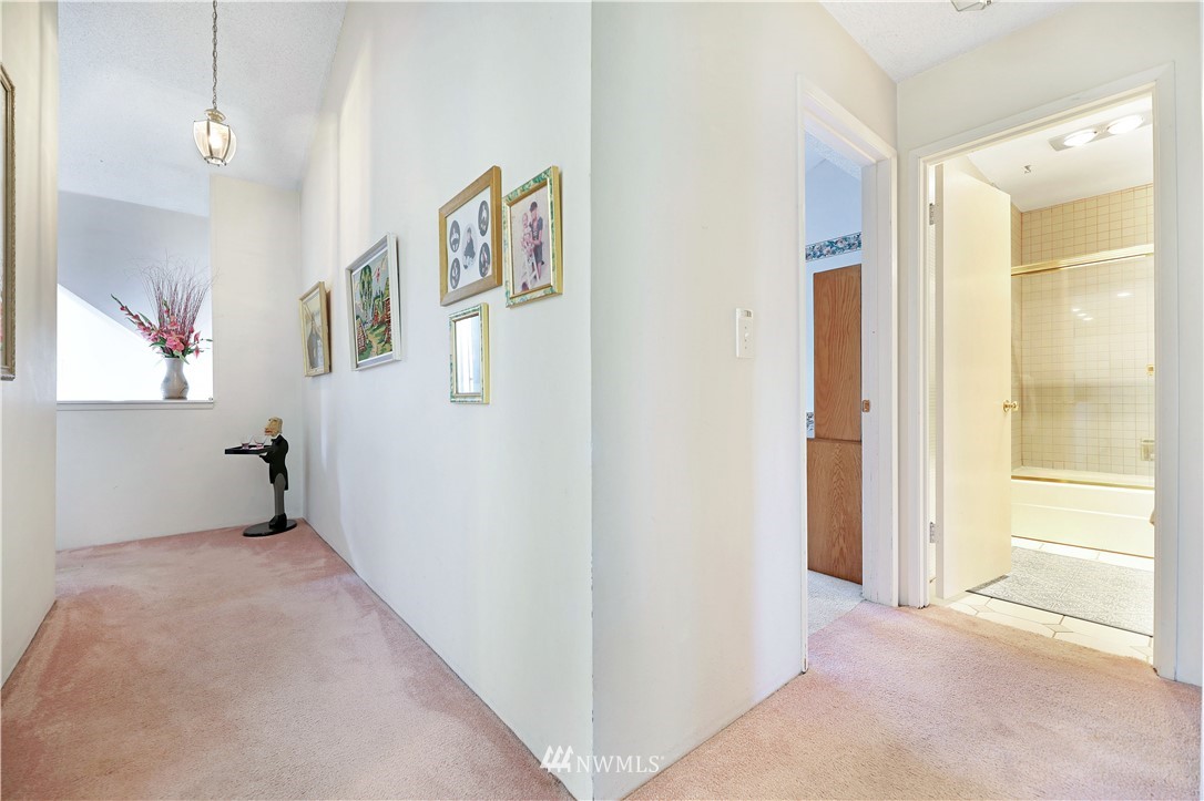 6413 Sand Point Way Northeast Seattle, WA 98115 - Photo 4 of 25 a view of an empty room