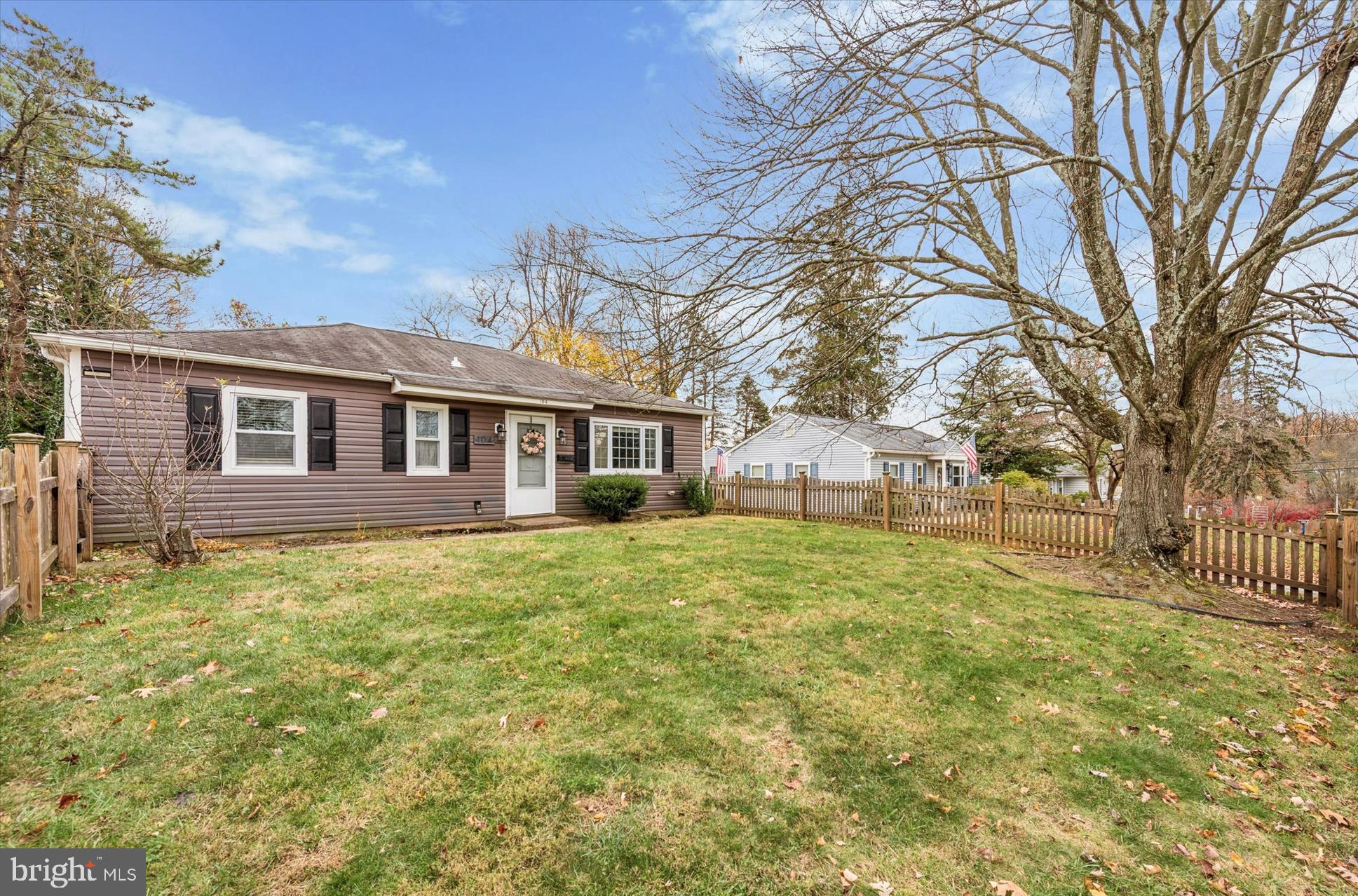 104 Lynbrook Road Paoli, PA 19301 - Photo 2 of 31 a front view of a house with a yard