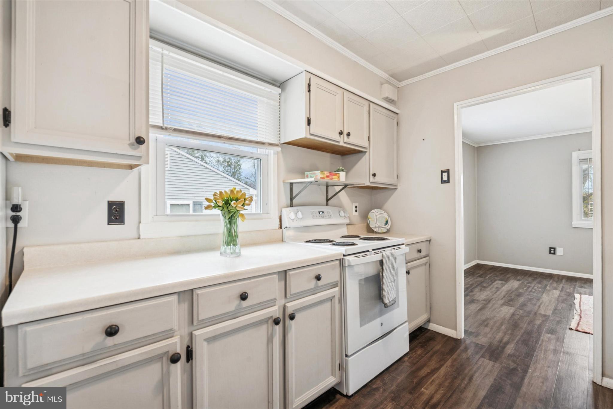 104 Lynbrook Road Paoli, PA 19301 - Photo 6 of 31 a kitchen with stainless steel appliances white cabinets and a sink
