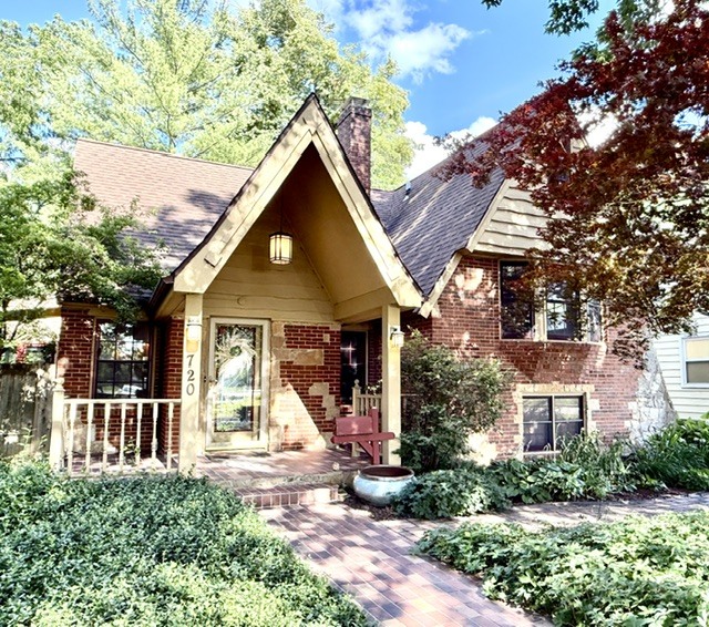 720 South New Street Champaign, IL 61820 - Photo 72 of 73 a front view of a house with a yard