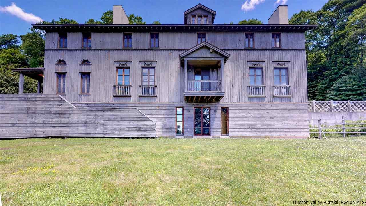 38 Frost Valley Road Claryville, NY 12725 - Photo 1 of 30 a front view of a house with garden