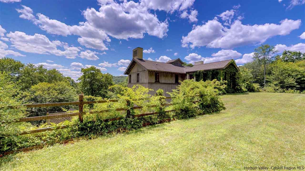 38 Frost Valley Road Claryville, NY 12725 - Photo 3 of 30 a view of a garden with a building