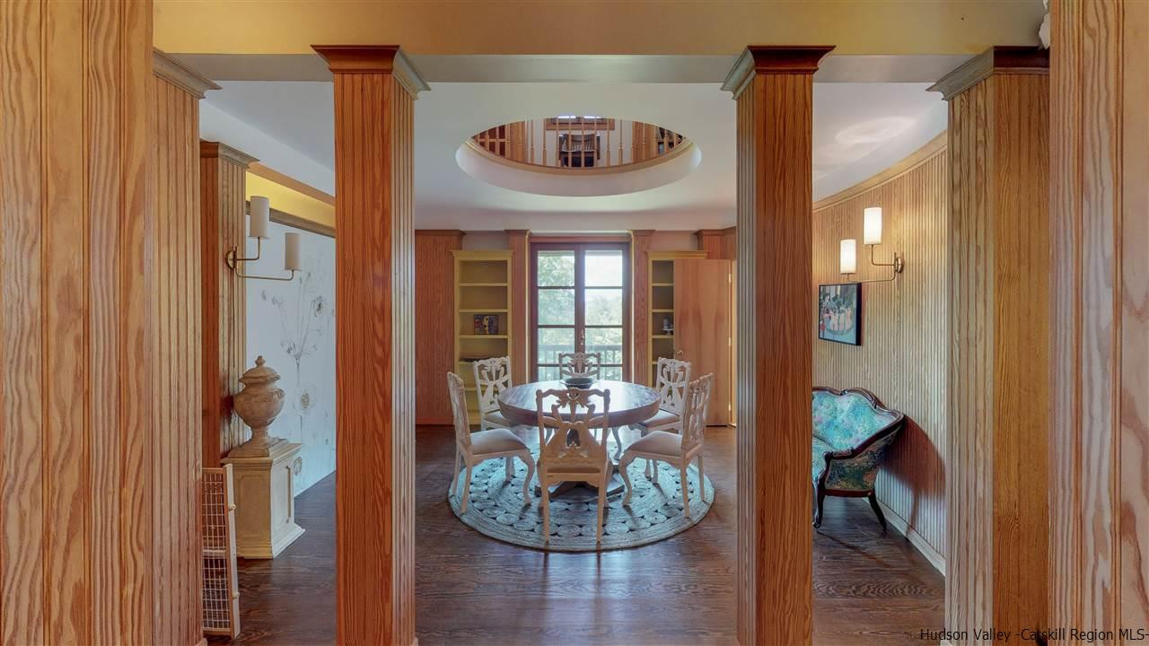 38 Frost Valley Road Claryville, NY 12725 - Photo 4 of 30 a dining room with furniture and a chandelier