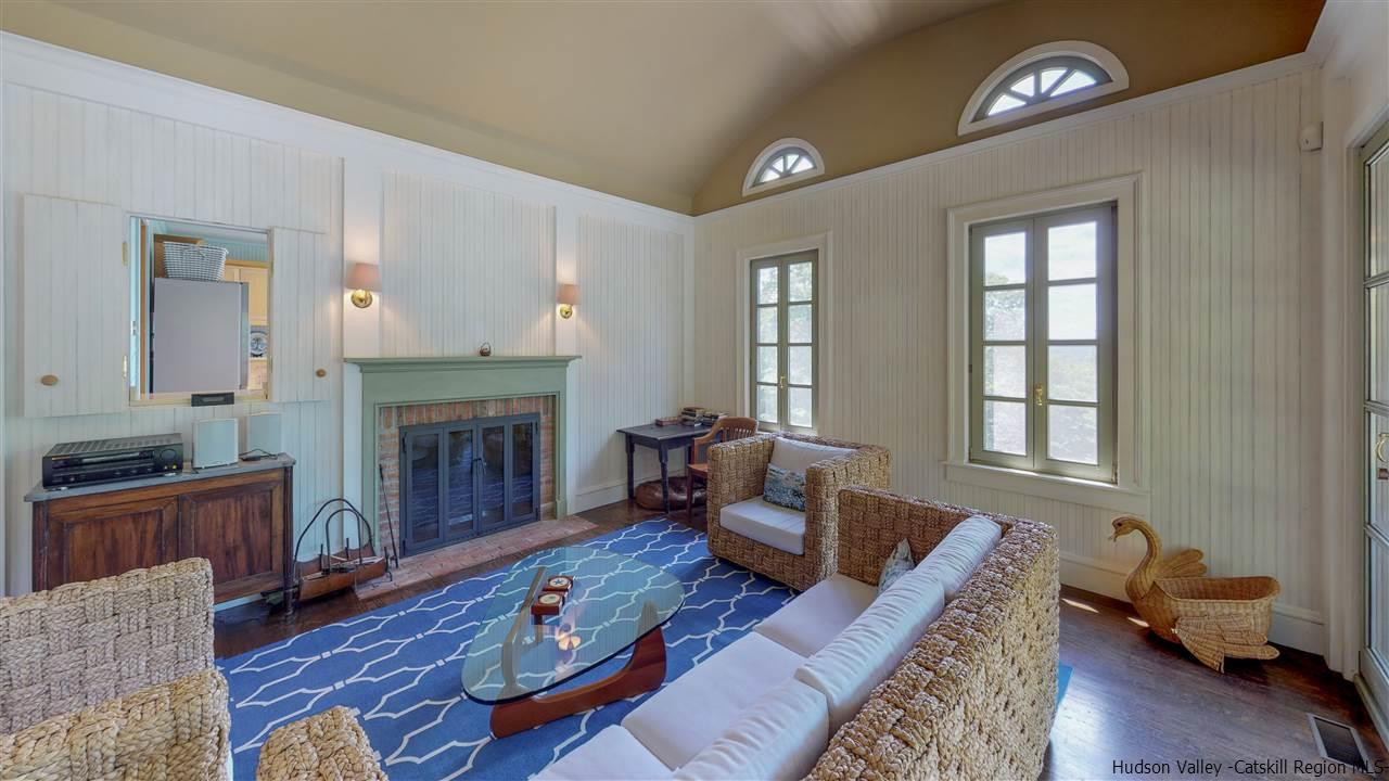 38 Frost Valley Road Claryville, NY 12725 - Photo 8 of 30 a living room with furniture and a fireplace