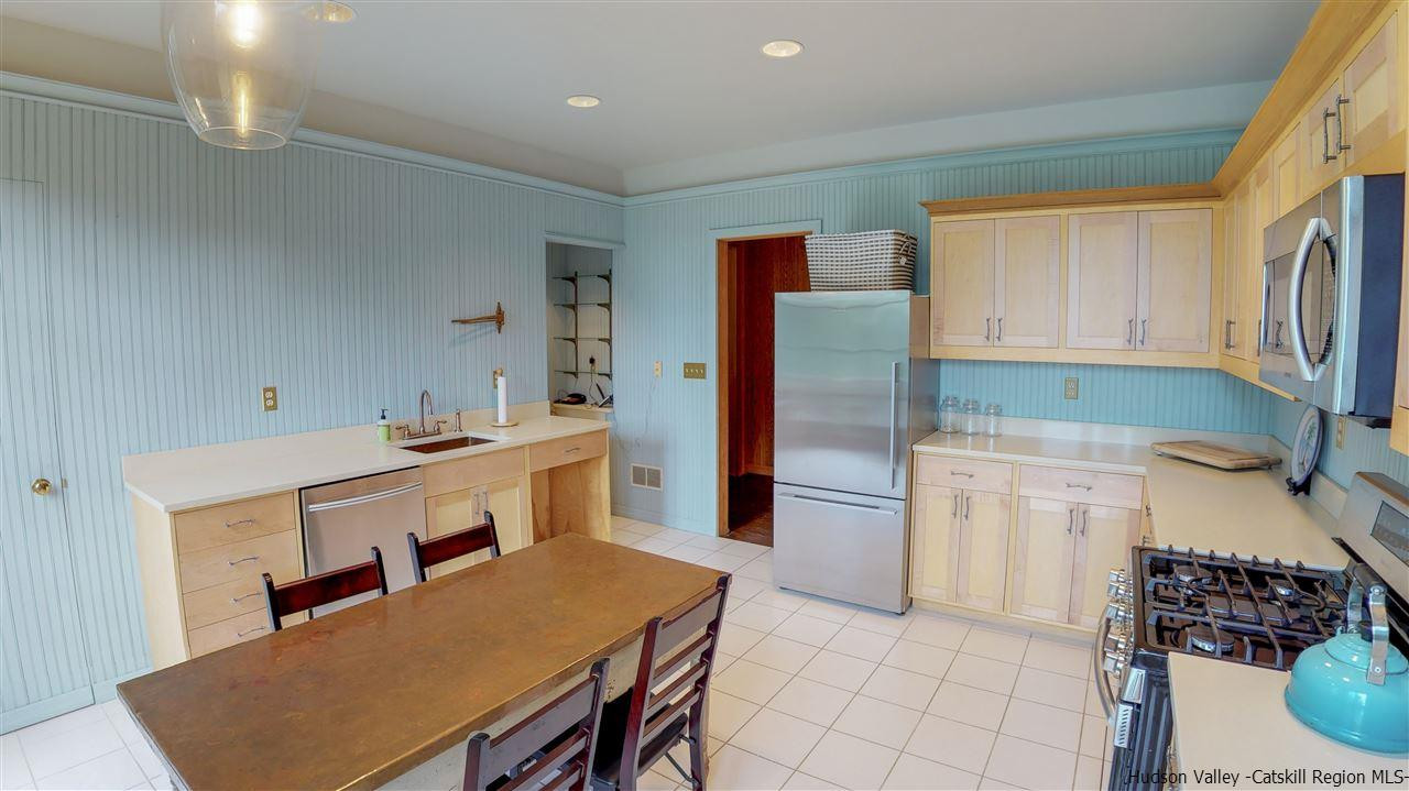 38 Frost Valley Road Claryville, NY 12725 - Photo 10 of 30 a kitchen with a sink appliances and cabinets
