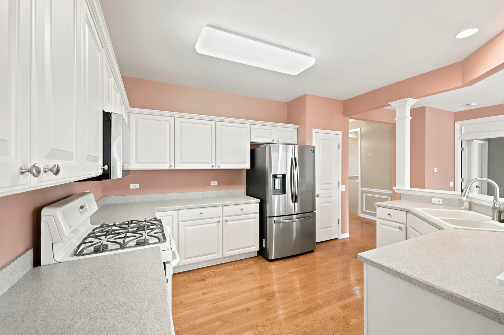 11923 Harrison Road Huntley, IL 60142 - Photo 12 of 38 a kitchen with stainless steel appliances granite countertop a refrigerator and a stove