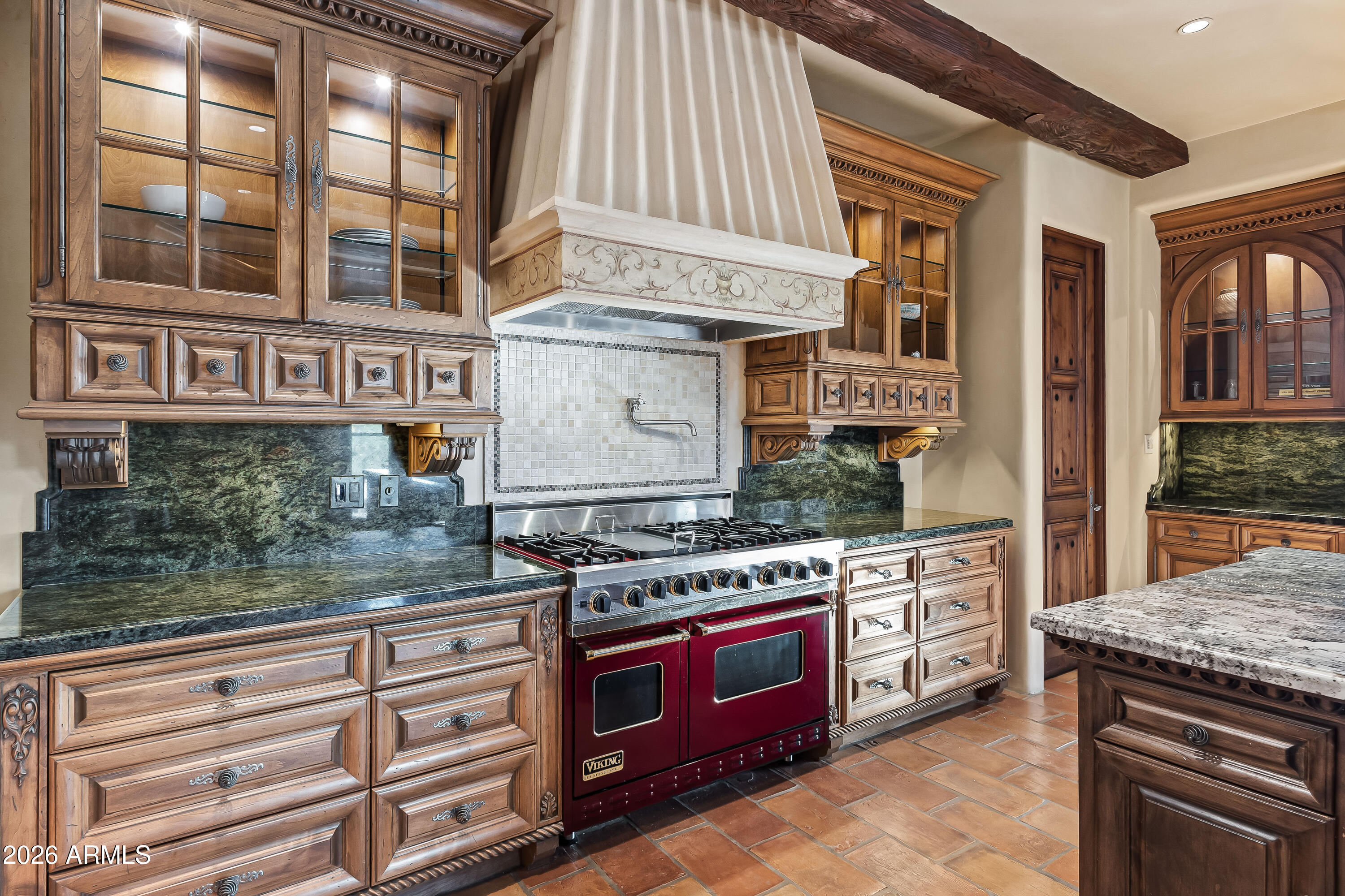 3900 East Bethany Home Road Paradise Valley, AZ 85253 - Photo 14 of 51 a kitchen with stainless steel appliances granite countertop a stove and a sink