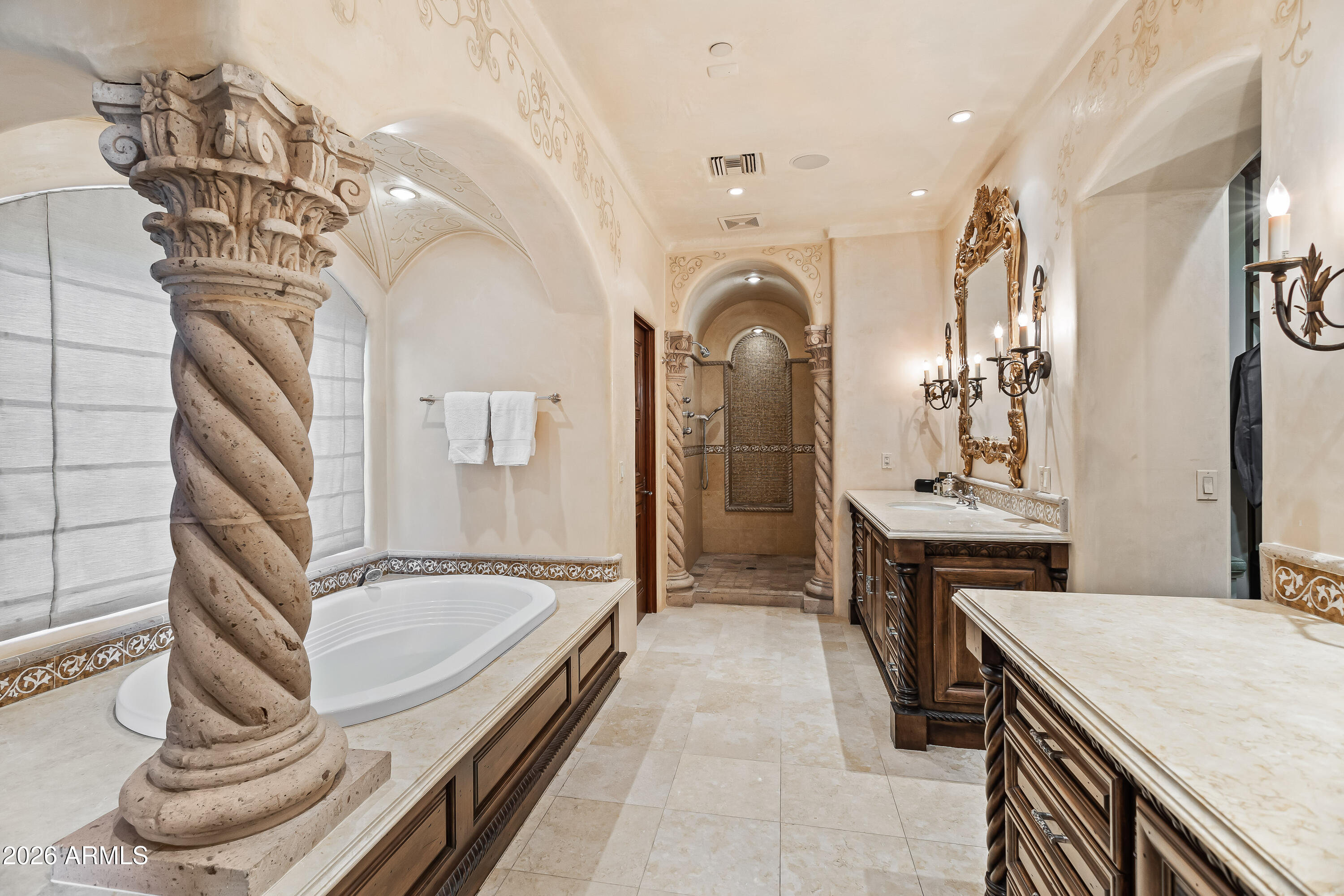 3900 East Bethany Home Road Paradise Valley, AZ 85253 - Photo 20 of 51 a bathroom with a sink a bathtub and a shower