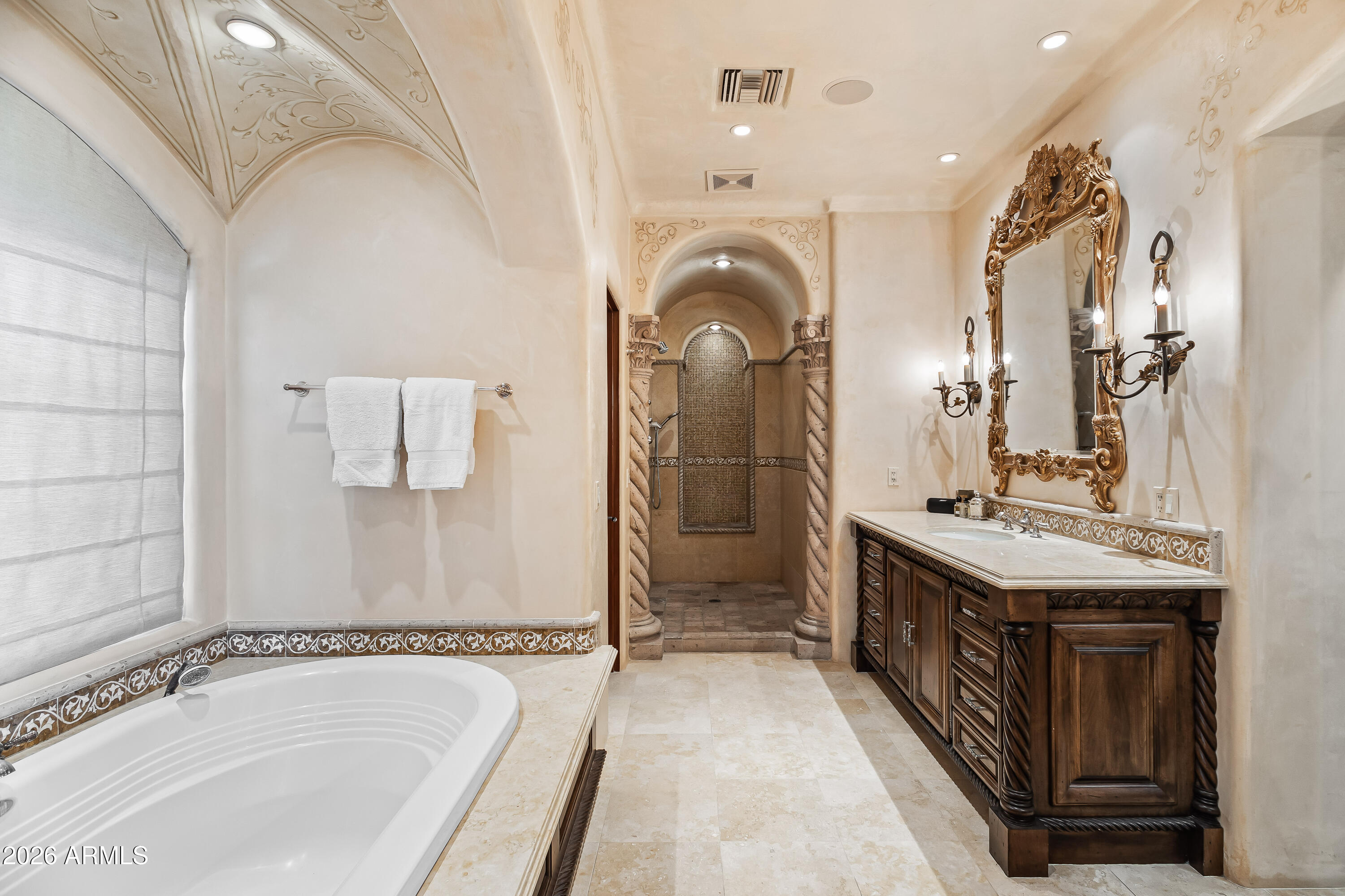 3900 East Bethany Home Road Paradise Valley, AZ 85253 - Photo 21 of 51 a bathroom with a tub sink shower and mirror