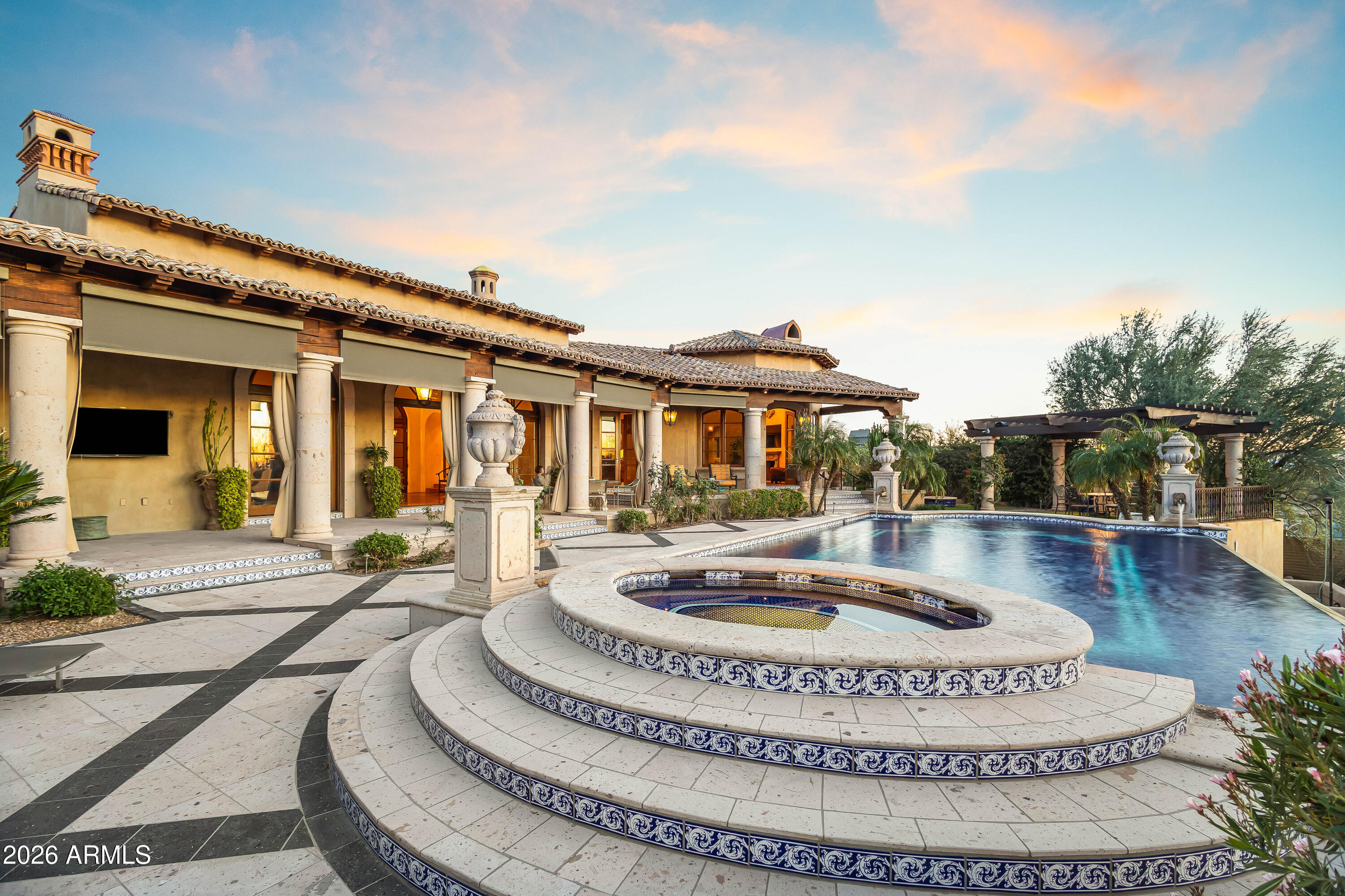 3900 East Bethany Home Road Paradise Valley, AZ 85253 - Photo 26 of 51 a view of a house with swimming pool and sitting area