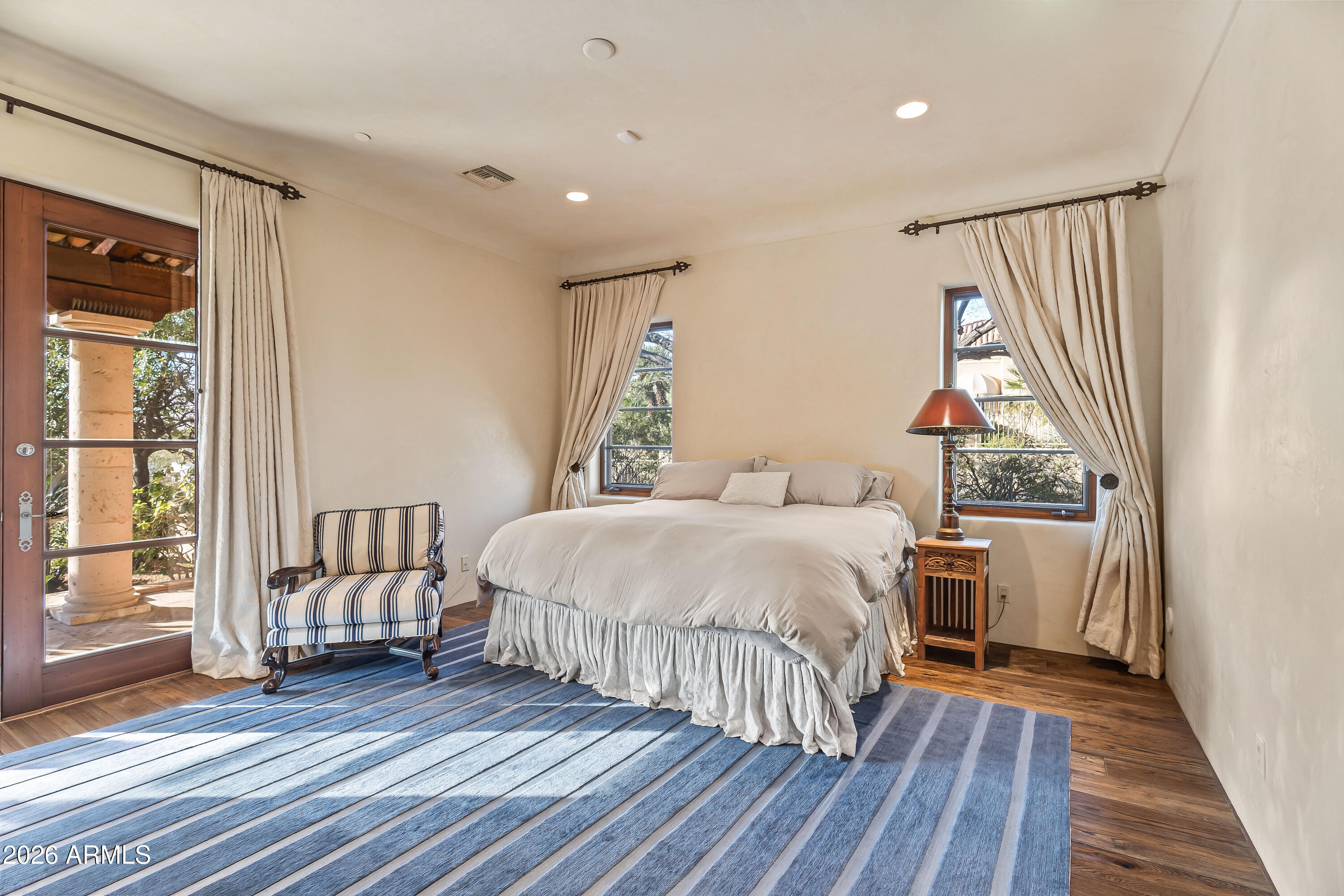 3900 East Bethany Home Road Paradise Valley, AZ 85253 - Photo 34 of 51 a bedroom with a bed and a large window