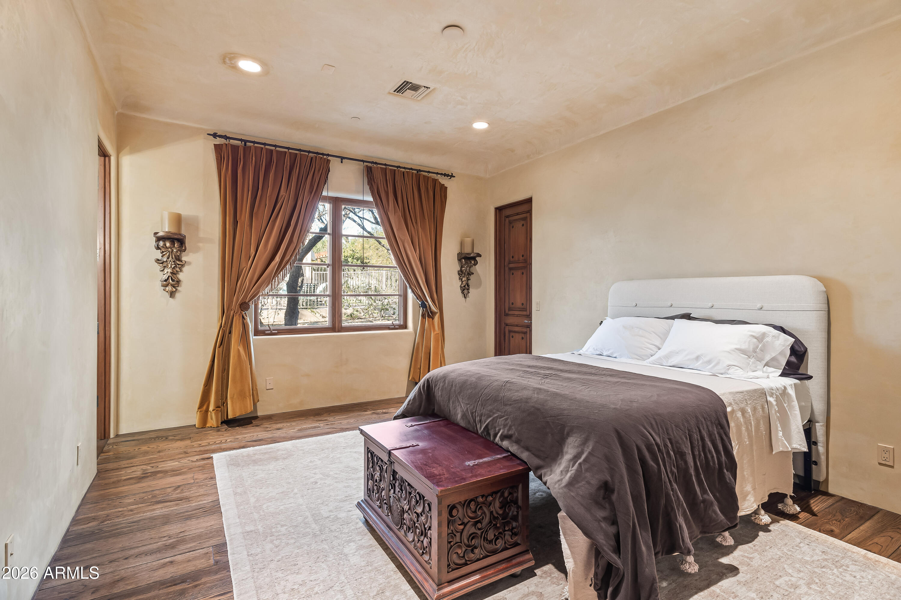 3900 East Bethany Home Road Paradise Valley, AZ 85253 - Photo 36 of 51 a bedroom with a bed and a window