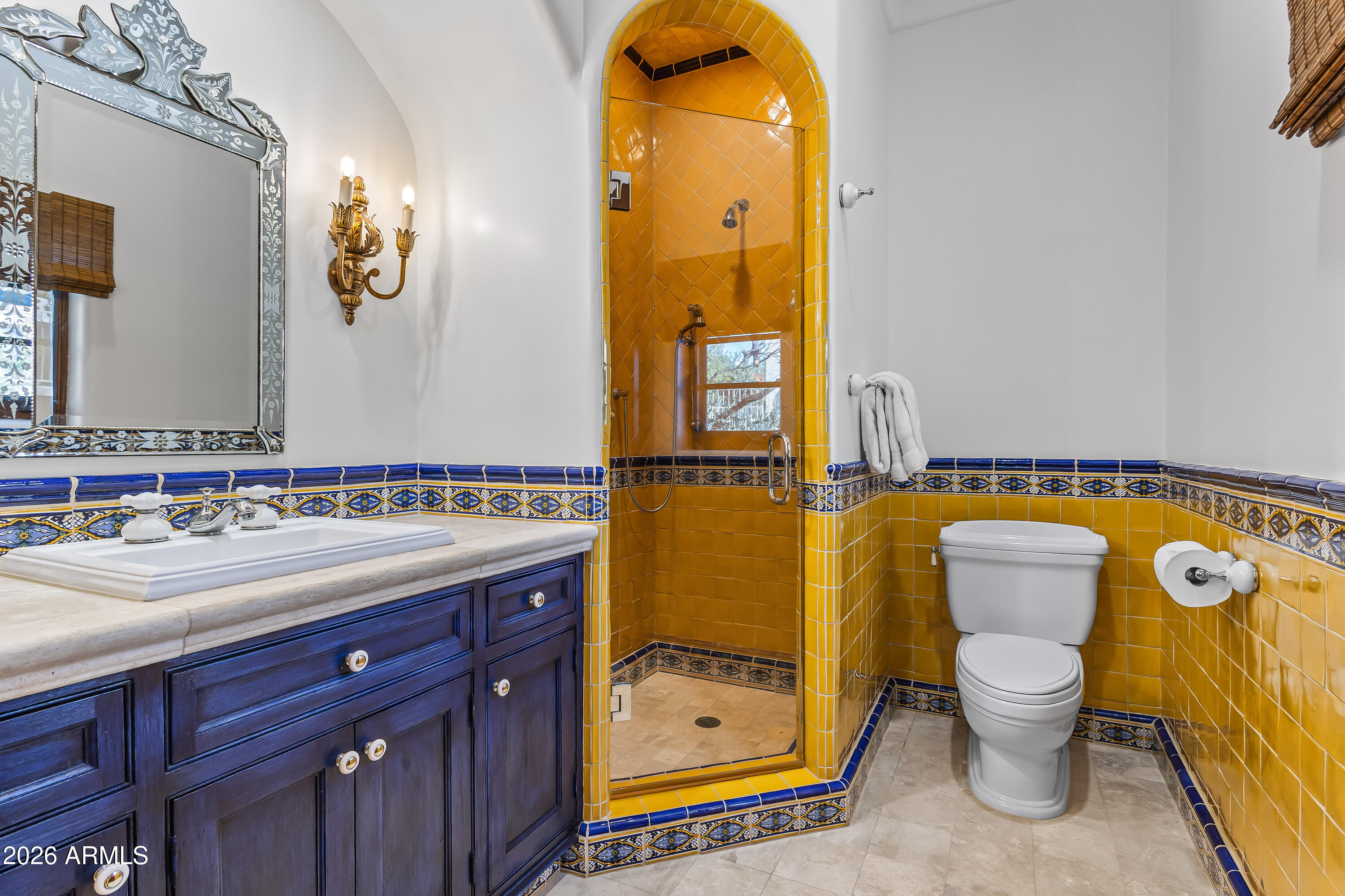 3900 East Bethany Home Road Paradise Valley, AZ 85253 - Photo 37 of 51 a bathroom with a toilet sink and mirror
