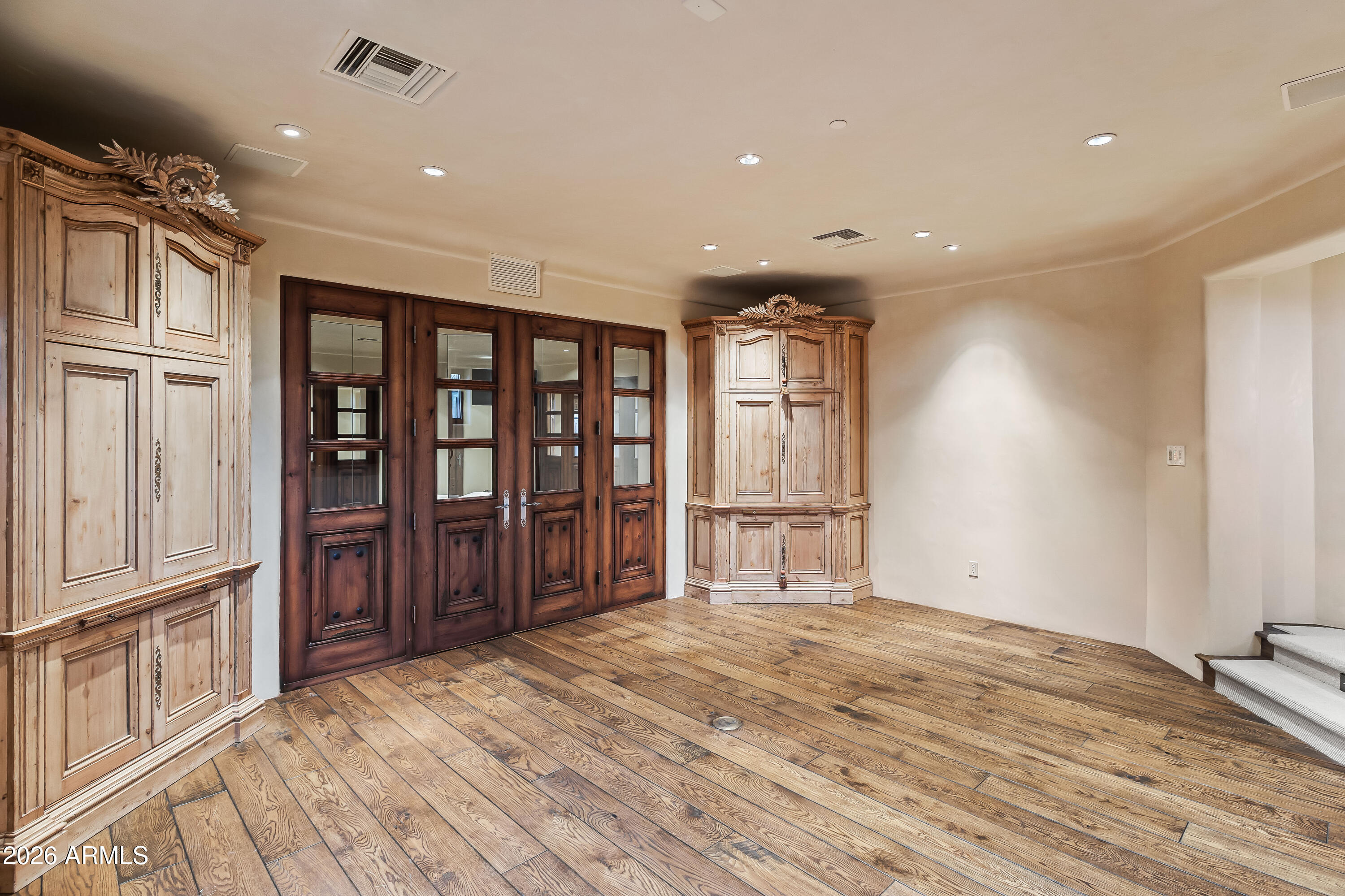 3900 East Bethany Home Road Paradise Valley, AZ 85253 - Photo 42 of 51 a view of empty room with wooden floor