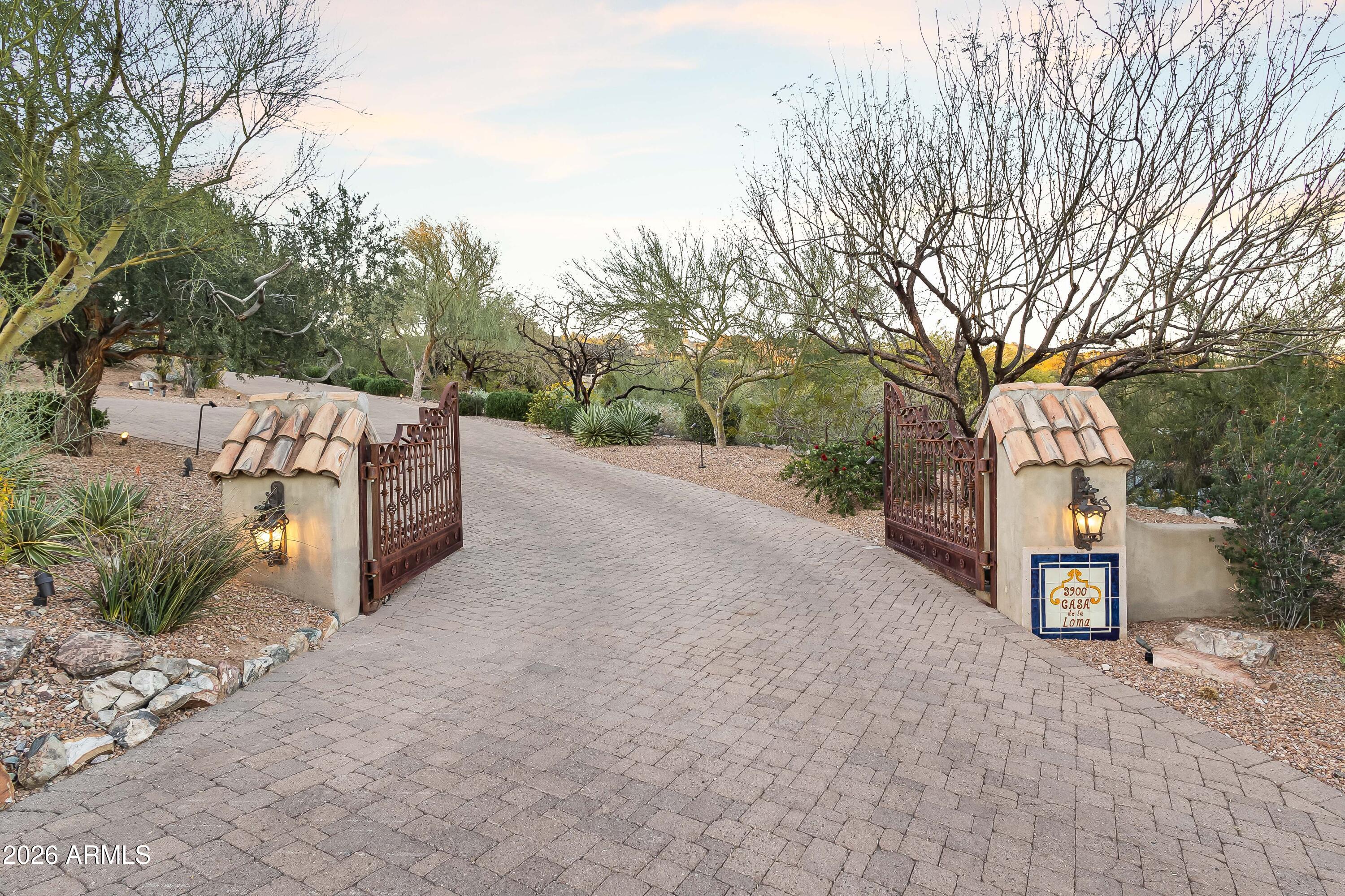 3900 East Bethany Home Road Paradise Valley, AZ 85253 - Photo 43 of 51 a view of a road with large trees