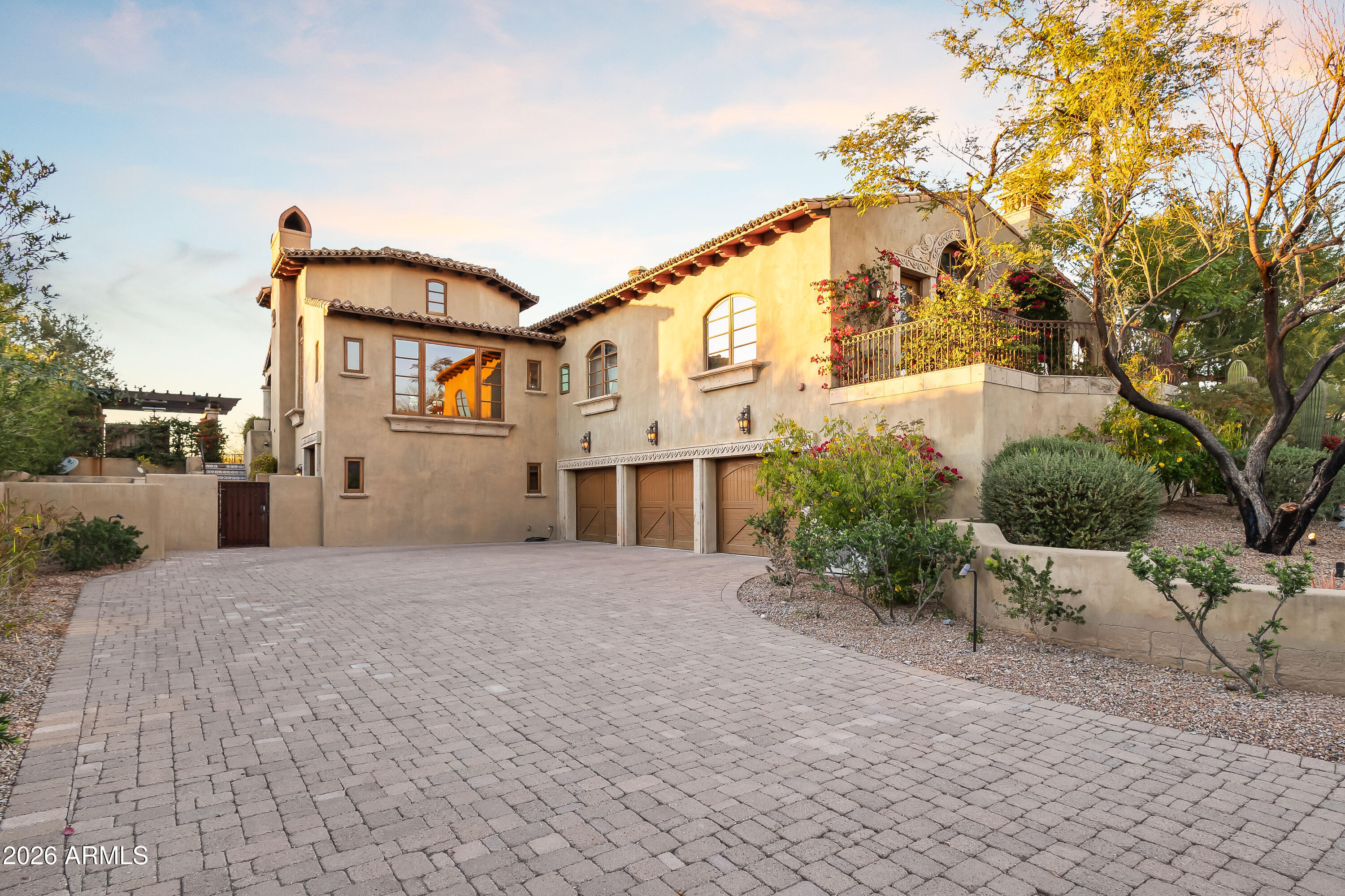 3900 East Bethany Home Road Paradise Valley, AZ 85253 - Photo 48 of 51 a front view of a house with a yard and potted plants