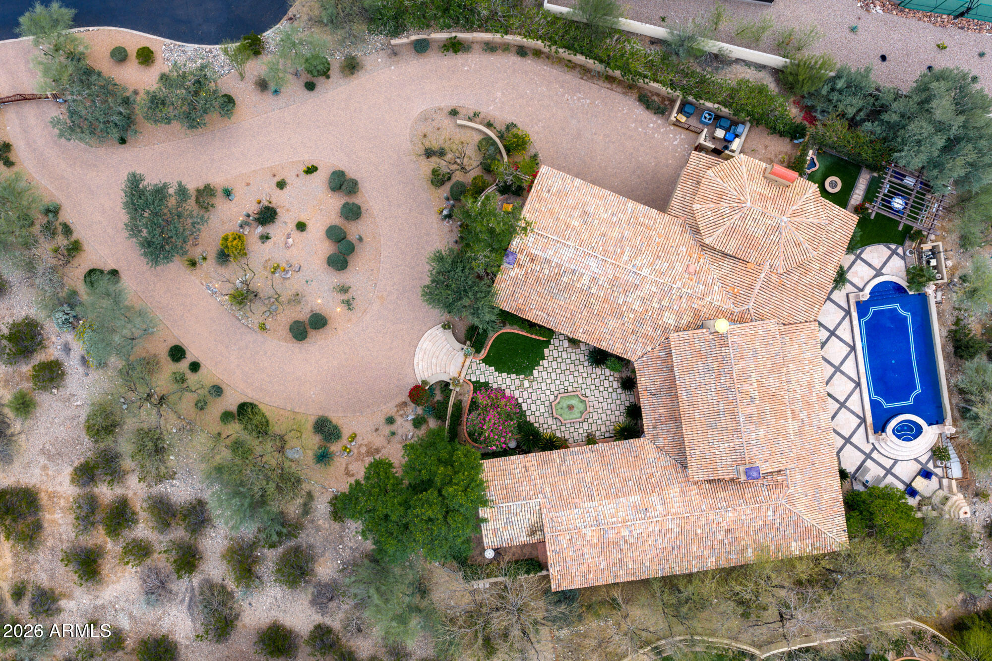 3900 East Bethany Home Road Paradise Valley, AZ 85253 - Photo 51 of 51 an aerial view of a house with a yard and garden