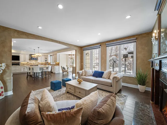 a bedroom with furniture and a wooden floor