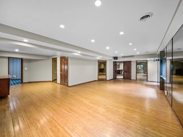 a view of a patio with dining table and chairs with plants