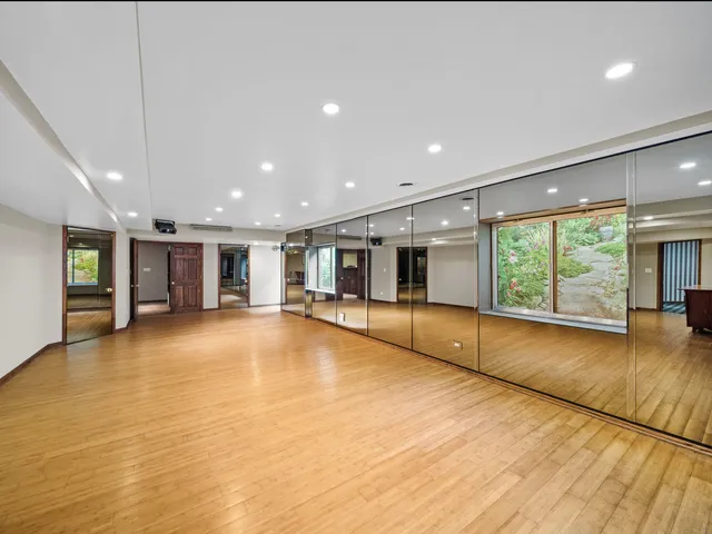 a view of a patio with a table and chairs