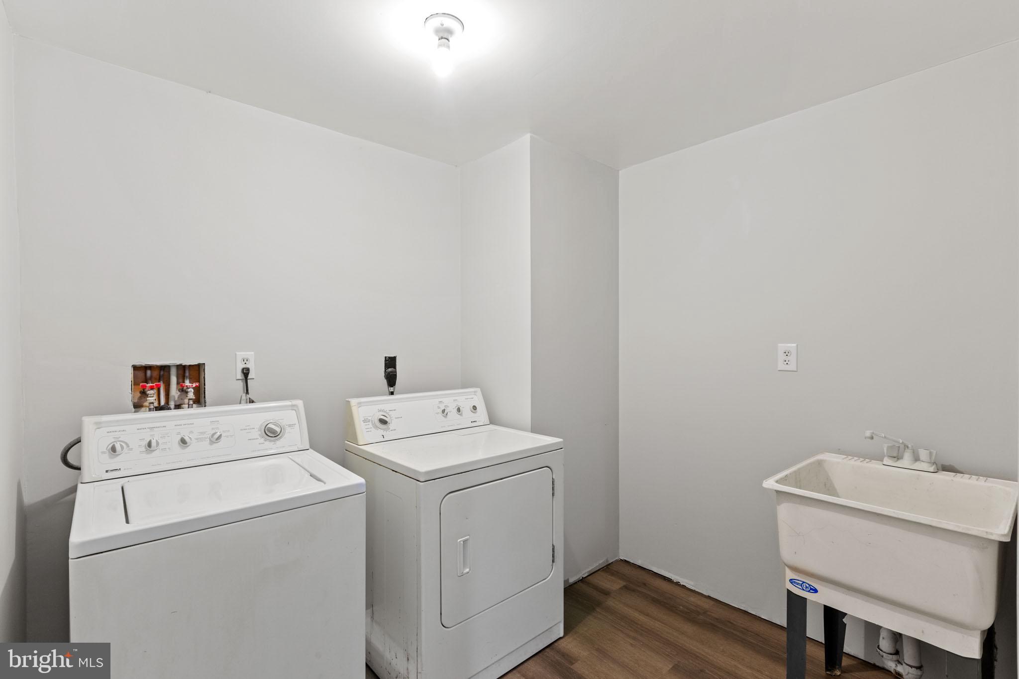 7830 Pine Boulevard Lusby, MD 20657 - Photo 25 of 30 a utility room with dryer and washer