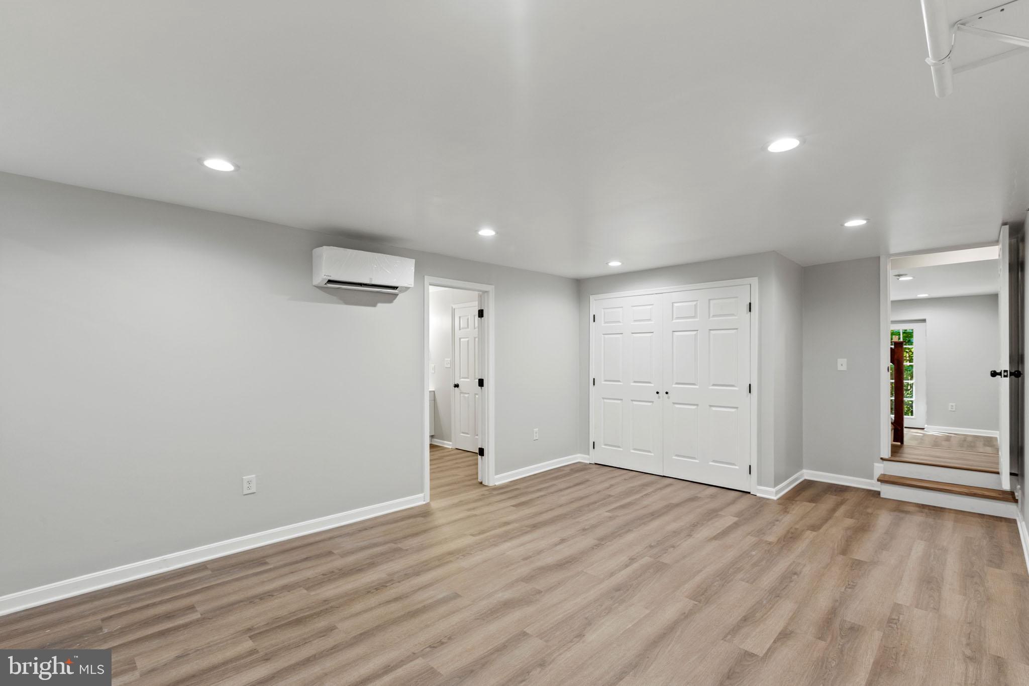 7830 Pine Boulevard Lusby, MD 20657 - Photo 27 of 30 a view of empty room with wooden floor
