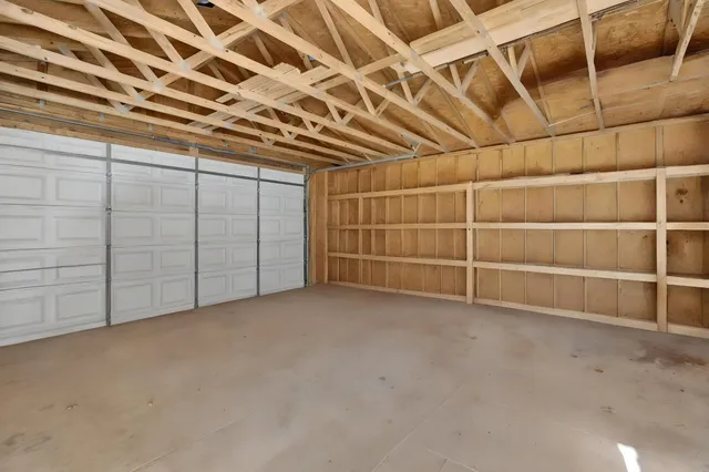 a view of a backyard of the house