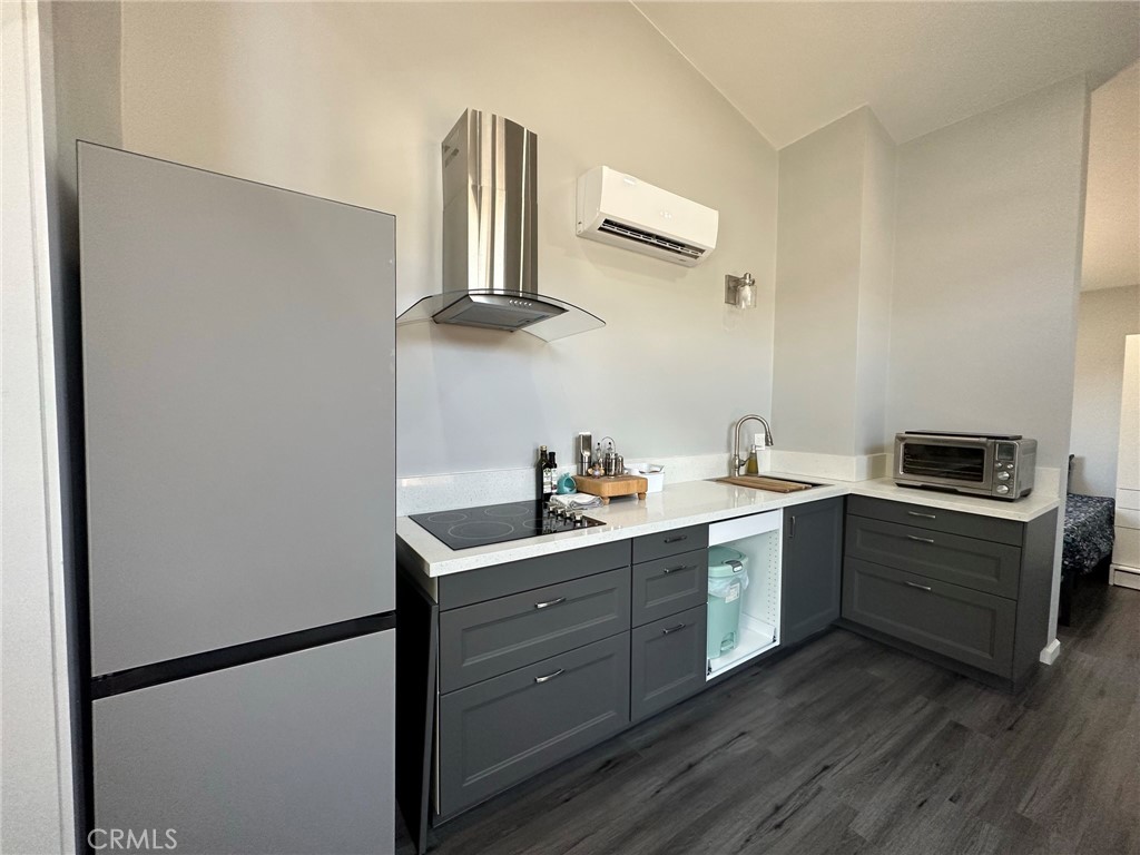 622 Broadway Gilroy, CA 95020 - Photo 3 of 6 a kitchen with cabinets and stainless steel appliances