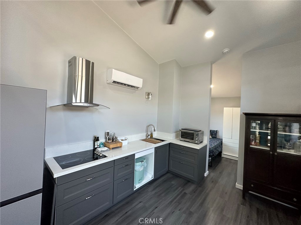 622 Broadway Gilroy, CA 95020 - Photo 4 of 6 a kitchen with granite countertop a sink and cabinets