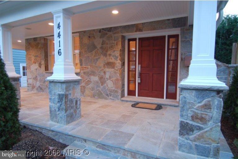 4416 Ridge Street Chevy Chase, MD 20815 - Photo 2 of 20 a front view of a house with many windows