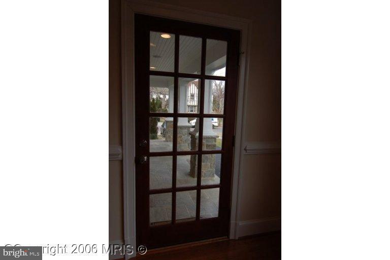 4416 Ridge Street Chevy Chase, MD 20815 - Photo 11 of 20 a close view of a room with a large window
