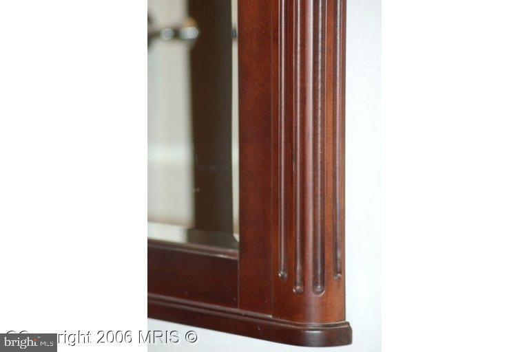 4416 Ridge Street Chevy Chase, MD 20815 - Photo 13 of 20 a picture of a bench in a window