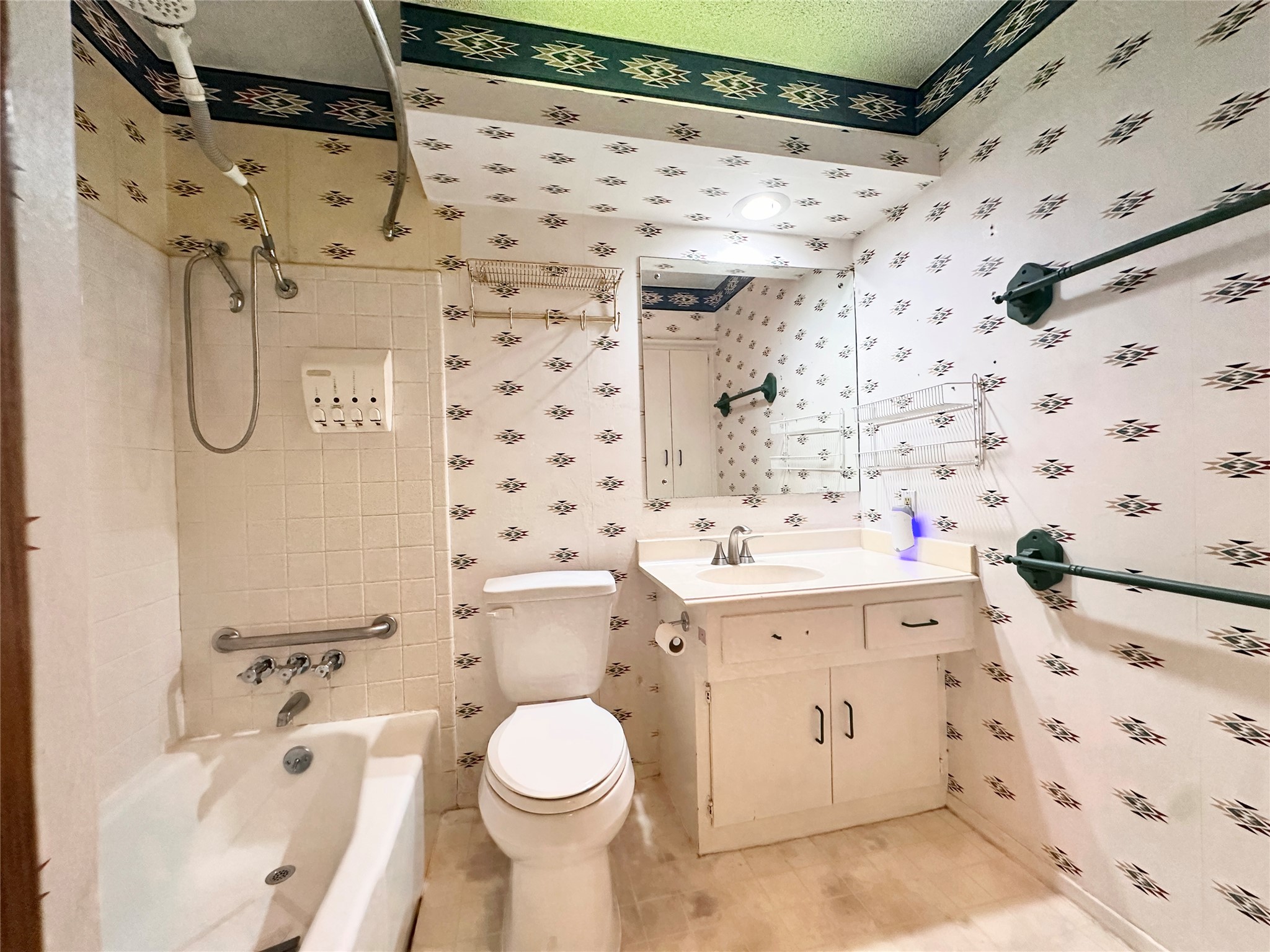 1704 Parkside Lane Austin, TX 78745 - Photo 12 of 39 Bathroom 2 has a large open 1960's layout, and features a oversized vanity, and built-in linen closet