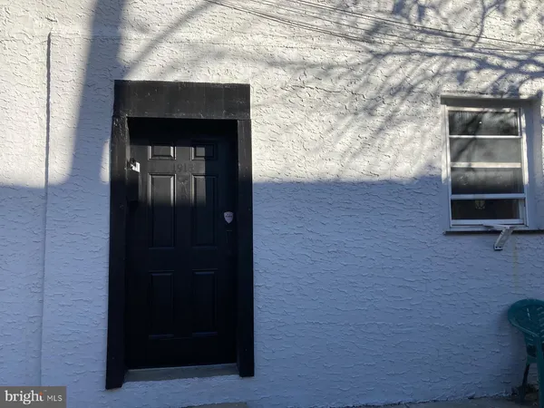 a brick house with a door