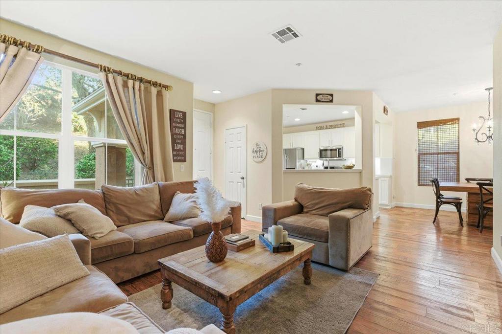 1101 Goddard Street San Marcos, CA 92078 - Photo 17 of 38 a living room with furniture and a large window