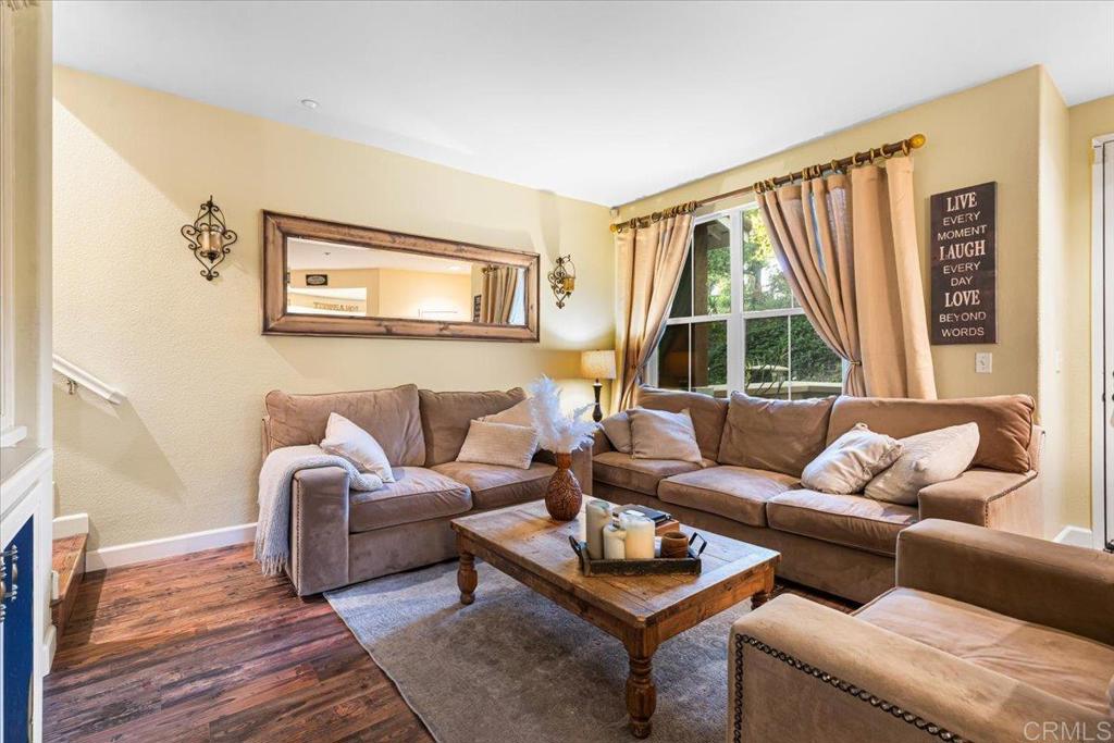 1101 Goddard Street San Marcos, CA 92078 - Photo 18 of 38 a living room with furniture and a large window