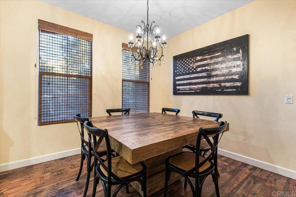 1101 Goddard Street San Marcos, CA 92078 - Photo 19 of 38 a view of a dining room with furniture window and wooden floor