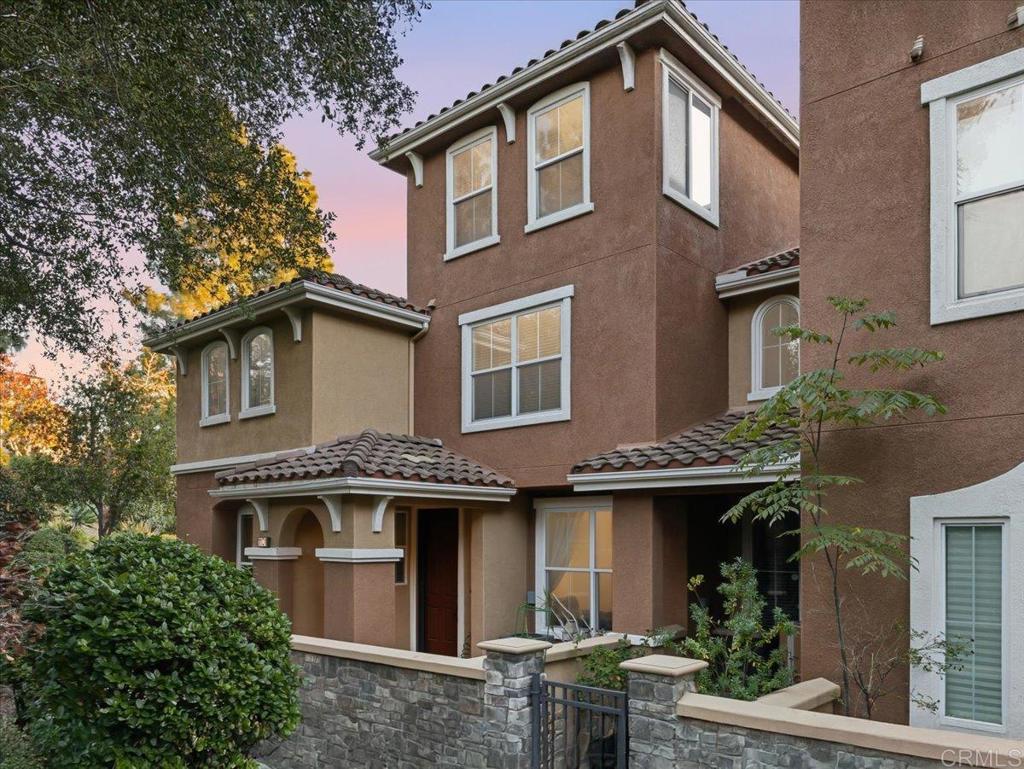 1101 Goddard Street San Marcos, CA 92078 - Photo 2 of 38 a front view of a house with plants