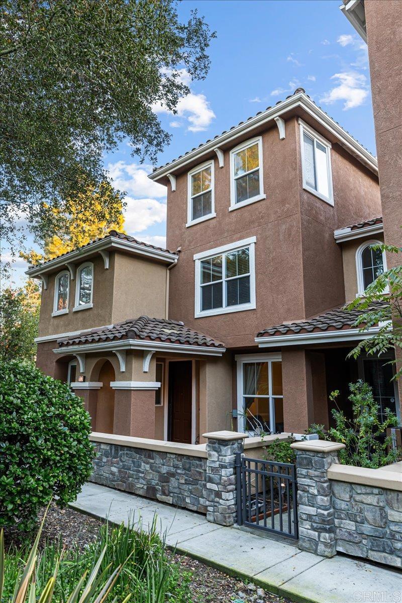 1101 Goddard Street San Marcos, CA 92078 - Photo 3 of 38 a front view of a house with yard and trees