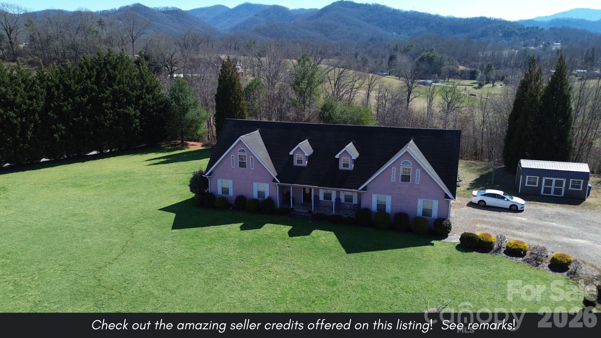 130 Crestview Street Canton, NC 28716 - Photo 2 of 42 a view of a back yard