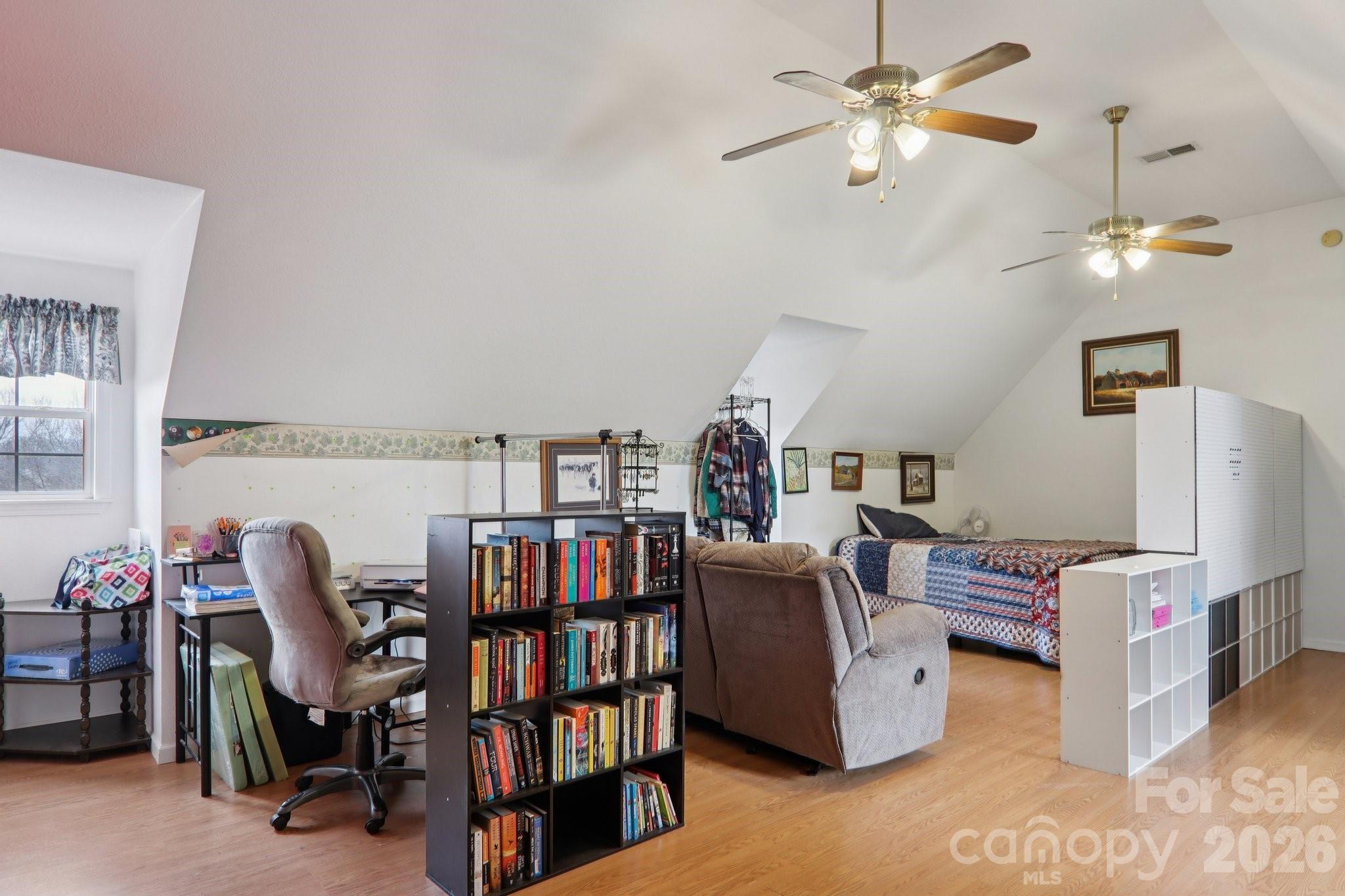 130 Crestview Street Canton, NC 28716 - Photo 31 of 42 a view of a workspace with furniture and toys