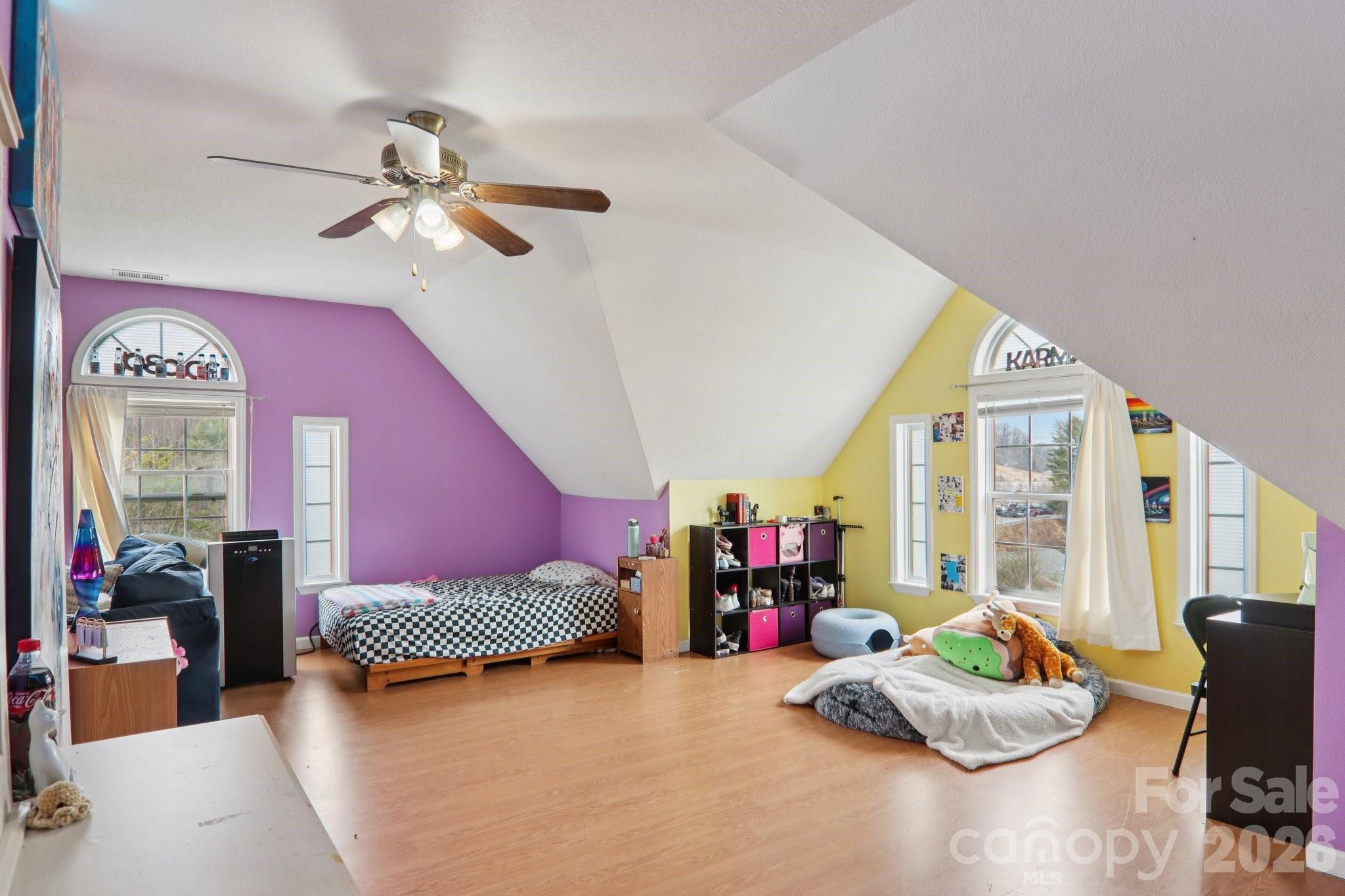 130 Crestview Street Canton, NC 28716 - Photo 36 of 42 a bedroom with furniture and a large window