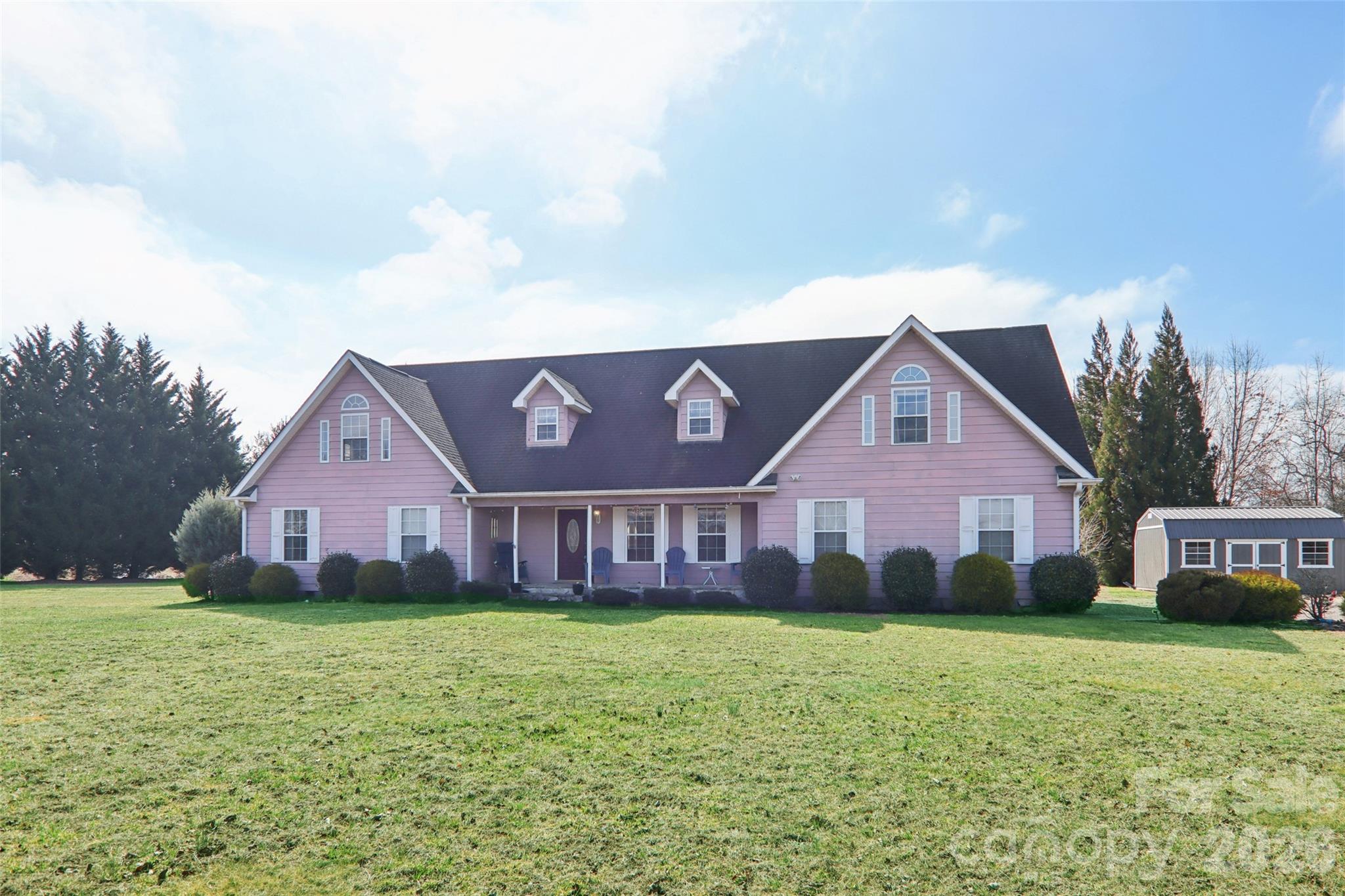 130 Crestview Street Canton, NC 28716 - Photo 7 of 42 a front view of house with yard and green space