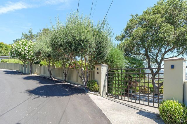 a view of a backyard with a garden