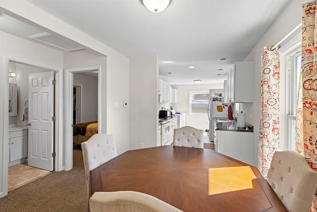 a living room with furniture fireplace and a flat screen tv