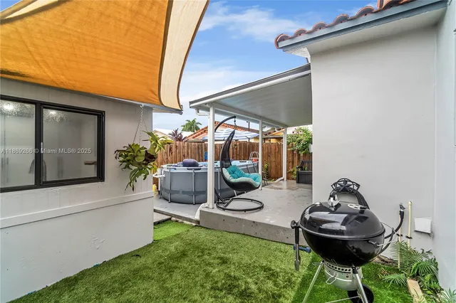 a house view with a garden space