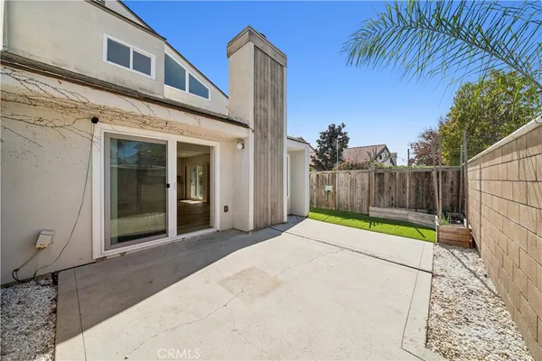 a view of a back yard with a house