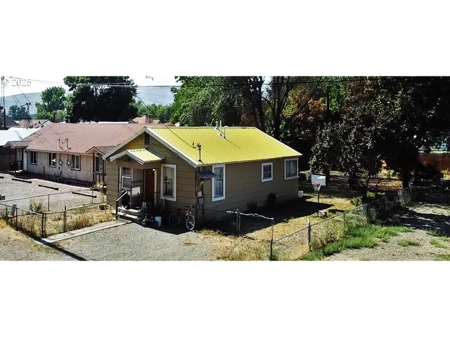 a terrace of a house with outdoor seating